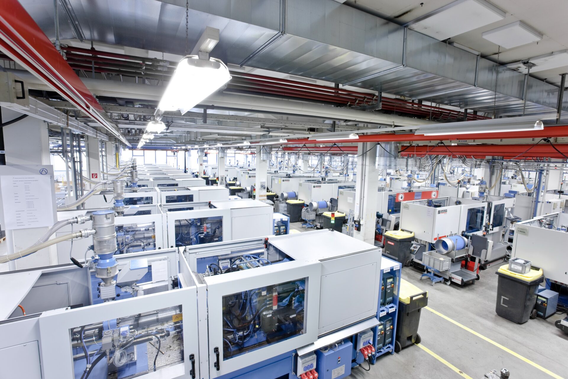 Hirschmann Automotive production hall with injection molding machines